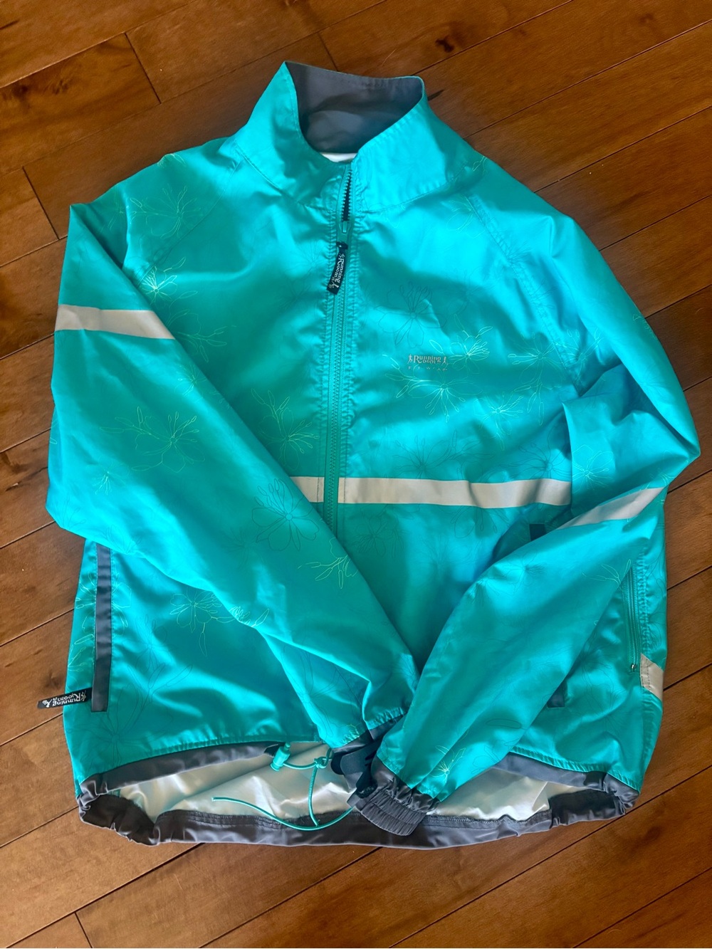 Running Room Teal Lightweight Windbreaker Jacket with Reflective Stripe